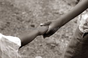 black holding hands